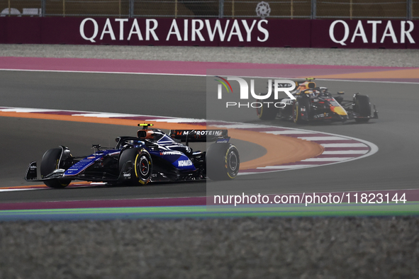 Franco Colapinto of Williams and Sergio Perez of Red Bull Racing during Sprint ahead of the Formula 1 Grand Prix of Qatar at Lusail Internat...