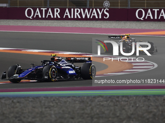 Franco Colapinto of Williams and Sergio Perez of Red Bull Racing during Sprint ahead of the Formula 1 Grand Prix of Qatar at Lusail Internat...