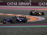 Franco Colapinto of Williams and Sergio Perez of Red Bull Racing during Sprint ahead of the Formula 1 Grand Prix of Qatar at Lusail Internat...