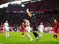 Kamil Grabara of VfL Wolfsburg  controls the ball during the Bundesliga match between RB Leipzig and VfL Wolfsburg at Red Bull Arena, Leipzi...