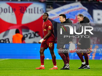 Castello Lukeba of RB Leipzig  looks on during the Bundesliga match between RB Leipzig and VfL Wolfsburg at Red Bull Arena, Leipzig, Germany...