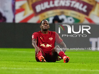 Castello Lukeba of RB Leipzig  looks on during the Bundesliga match between RB Leipzig and VfL Wolfsburg at Red Bull Arena, Leipzig, Germany...