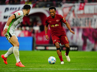 Lois Openda of RB Leipzig  controls the ball during the Bundesliga match between RB Leipzig and VfL Wolfsburg at Red Bull Arena, Leipzig, Ge...