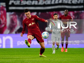 Benjamin Sesko of RB Leipzig  controls the ball during the Bundesliga match between RB Leipzig and VfL Wolfsburg at Red Bull Arena, Leipzig,...