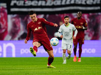 Benjamin Sesko of RB Leipzig  controls the ball during the Bundesliga match between RB Leipzig and VfL Wolfsburg at Red Bull Arena, Leipzig,...