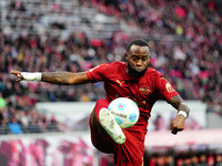 Lutsharel Geertruida of RB Leipzig  controls the ball during the Bundesliga match between RB Leipzig and VfL Wolfsburg at Red Bull Arena, Le...