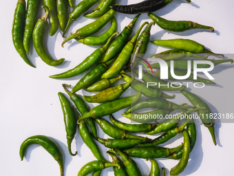 Green chilies, also known as hari mirch in India, are a staple ingredient in Indian cooking and are known for their distinct flavor and inte...