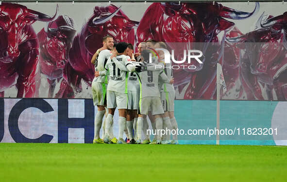 Joakim Maehle of VfL Wolfsburg  celebrates the teams fourth goal during the Bundesliga match between RB Leipzig and VfL Wolfsburg at Red Bul...