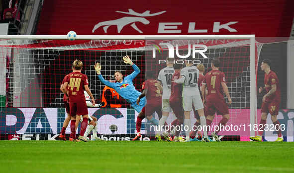 Joakim Maehle of VfL Wolfsburg  scores the teams fourth goal during the Bundesliga match between RB Leipzig and VfL Wolfsburg at Red Bull Ar...