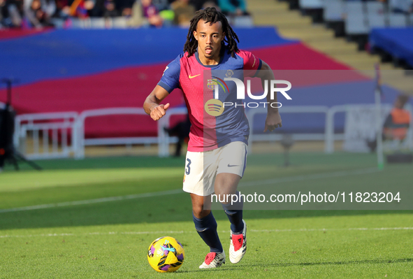 Jules Kounde plays during the match between FC Barcelona and UD Las Palmas, corresponding to week 15 of LaLiga EA Sports, at the Lluis Compa...