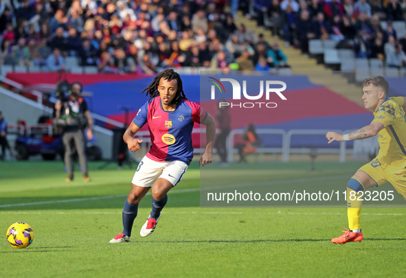 Jules Kounde plays during the match between FC Barcelona and UD Las Palmas, corresponding to week 15 of LaLiga EA Sports, at the Lluis Compa...