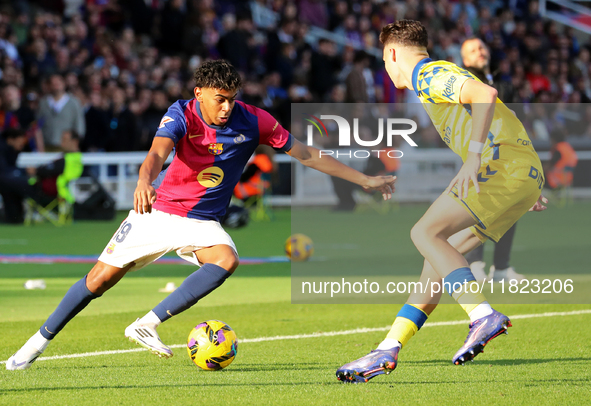 Lamine Yamal and Alberto Moleiro play during the match between FC Barcelona and UD Las Palmas, corresponding to week 15 of LaLiga EA Sports,...