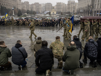 People attend a funeral ceremony for Ukrainian serviceman and founder of FC Obolon's ultras movement, Pavlo Vedybida, nicknamed ''Obolonchik...