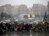 People attend a funeral ceremony for Ukrainian serviceman and founder of FC Obolon's ultras movement, Pavlo Vedybida, nicknamed ''Obolonchik...