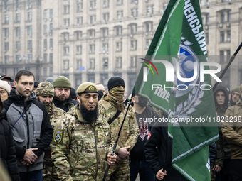 People attend a funeral ceremony for Ukrainian serviceman and founder of FC Obolon's ultras movement, Pavlo Vedybida, nicknamed ''Obolonchik...