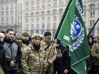 People attend a funeral ceremony for Ukrainian serviceman and founder of FC Obolon's ultras movement, Pavlo Vedybida, nicknamed ''Obolonchik...