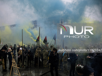 People attend a funeral ceremony for Ukrainian serviceman and founder of FC Obolon's ultras movement, Pavlo Vedybida, nicknamed ''Obolonchik...