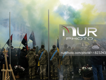 People attend a funeral ceremony for Ukrainian serviceman and founder of FC Obolon's ultras movement, Pavlo Vedybida, nicknamed ''Obolonchik...