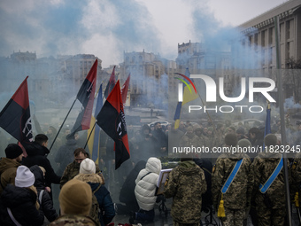 People attend a funeral ceremony for Ukrainian serviceman and founder of FC Obolon's ultras movement, Pavlo Vedybida, nicknamed ''Obolonchik...