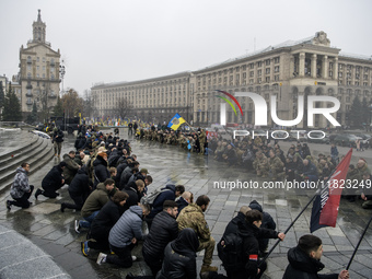 People attend a funeral ceremony for Ukrainian serviceman and founder of FC Obolon's ultras movement, Pavlo Vedybida, nicknamed ''Obolonchik...