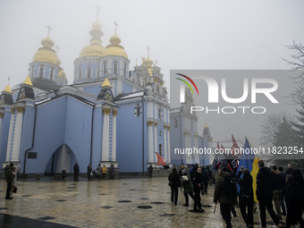 People attend a funeral service for Ukrainian serviceman and founder of FC Obolon's ultras movement, Pavlo Vedybida, nicknamed ''Obolonchik,...