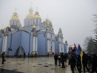 People attend a funeral service for Ukrainian serviceman and founder of FC Obolon's ultras movement, Pavlo Vedybida, nicknamed ''Obolonchik,...