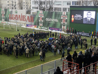 People attend a funeral ceremony for Ukrainian serviceman and founder of FC Obolon's ultras movement, Pavlo Vedybida, nicknamed ''Obolonchik...