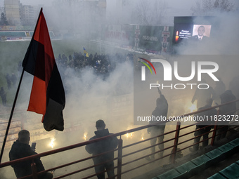 People attend a funeral ceremony for Ukrainian serviceman and founder of FC Obolon's ultras movement, Pavlo Vedybida, nicknamed ''Obolonchik...