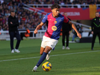 Lamine Yamal plays during the match between FC Barcelona and UD Las Palmas, corresponding to week 15 of LaLiga EA Sports, at the Lluis Compa...