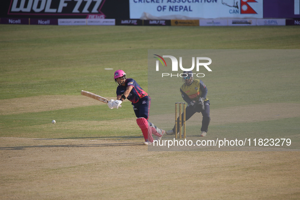 A player from Janakpur Bolts (Pink) plays a shot during the Nepal Premier League (NPL) in Kathmandu, Nepal, on November 30, 2024. 