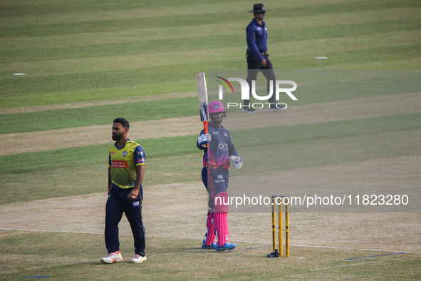 A player from Janakpur Bolts (Pink) plays a shot during the Nepal Premier League (NPL) in Kathmandu, Nepal, on November 30, 2024. 