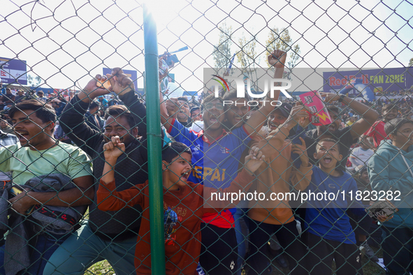 Nepali cricket fans and supporters celebrate during the inaugural match of the Nepal Premier League at TU Cricket ground in Kathmandu, Nepal...