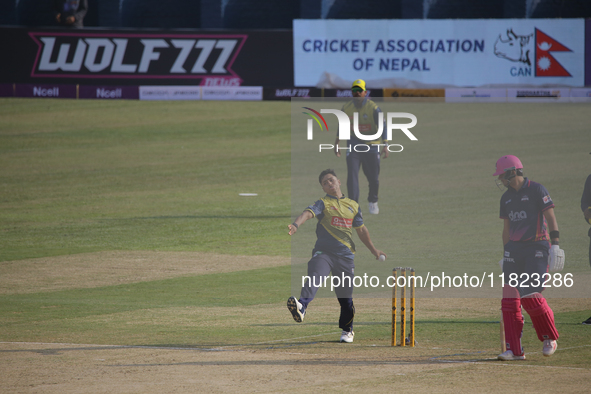 A player from Biratnagar Kings (Yellow) throws the ball against Janakpur Bolts during the Nepal Premier League (NPL) in Kathmandu, Nepal, on...