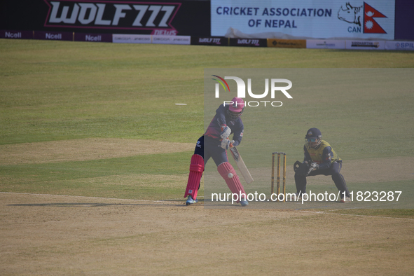 A player from Janakpur Bolts (Pink) plays a shot during the Nepal Premier League (NPL) in Kathmandu, Nepal, on November 30, 2024. 