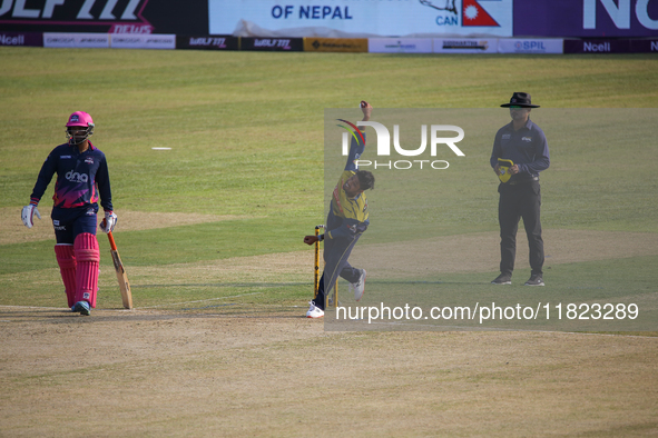 A player from Biratnagar Kings (Yellow) throws the ball against Janakpur Bolts during the Nepal Premier League (NPL) in Kathmandu, Nepal, on...