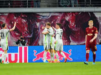 Kevin Behrens of VfL Wolfsburg  celebrates the teams fifth goal during the Bundesliga match between RB Leipzig and VfL Wolfsburg at Red Bull...