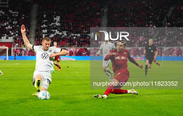 Antonio Nusa of RB Leipzig  controls the ball during the Bundesliga match between RB Leipzig and VfL Wolfsburg at Red Bull Arena, Leipzig, G...