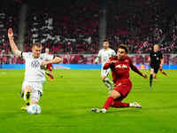 Antonio Nusa of RB Leipzig  controls the ball during the Bundesliga match between RB Leipzig and VfL Wolfsburg at Red Bull Arena, Leipzig, G...