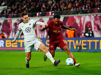 Lois Openda of RB Leipzig  controls the ball during the Bundesliga match between RB Leipzig and VfL Wolfsburg at Red Bull Arena, Leipzig, Ge...