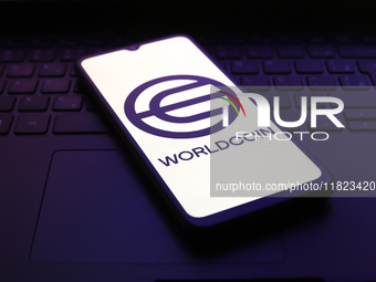 The Worldcoin logo appears on the screen of a smartphone in Reno, United States, on November 30, 2024. (