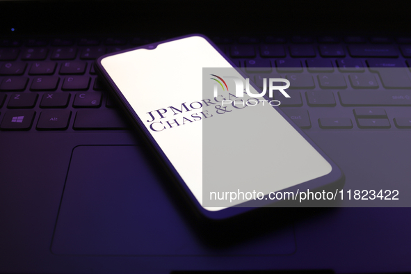 The JPMorgan Chase & Co logo appears on the screen of a smartphone in Reno, United States, on November 30, 2024. 