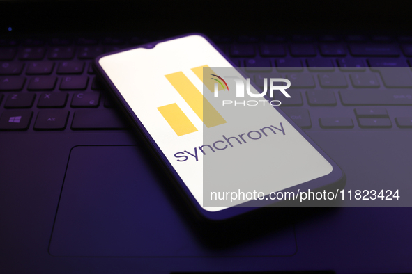 The Synchrony logo appears on the screen of a smartphone in Reno, United States, on November 30, 2024. 