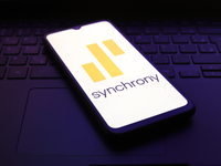 The Synchrony logo appears on the screen of a smartphone in Reno, United States, on November 30, 2024. (