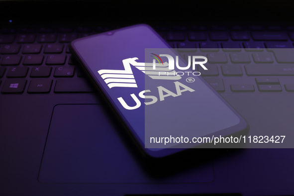 The United Services Automobile Association (USAA) logo appears on the screen of a smartphone in Reno, United States, on November 30, 2024. 