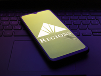 The Regions Financial Corporation (Regions Bank) logo appears on the screen of a smartphone in Reno, United States, on November 30, 2024. (