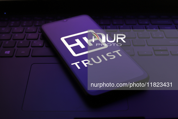 The Truist Financial (Truist Bank) logo appears on the screen of a smartphone in Reno, United States, on November 30, 2024. 