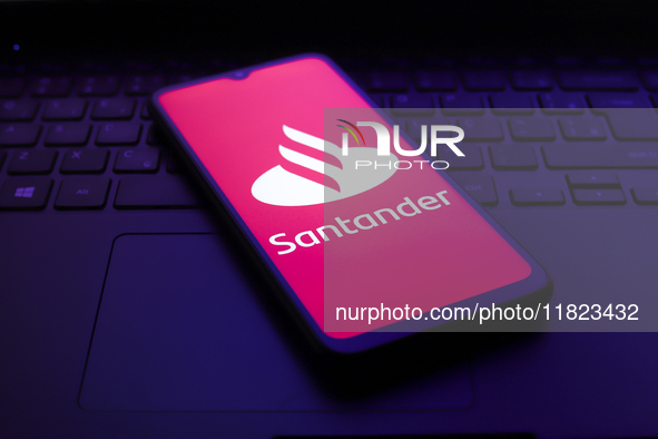 The Santander logo appears on the screen of a smartphone in Reno, United States, on November 30, 2024. 