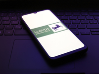 The Lloyds Banking Group (Lloyds Bank) logo appears on the screen of a smartphone in Reno, United States, on November 30, 2024. (