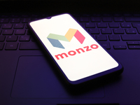 The Monzo Bank logo appears on the screen of a smartphone in Reno, United States, on November 30, 2024. (