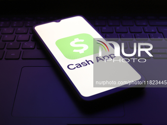 The Cash App logo appears on the screen of a smartphone in Reno, United States, on November 30, 2024. (